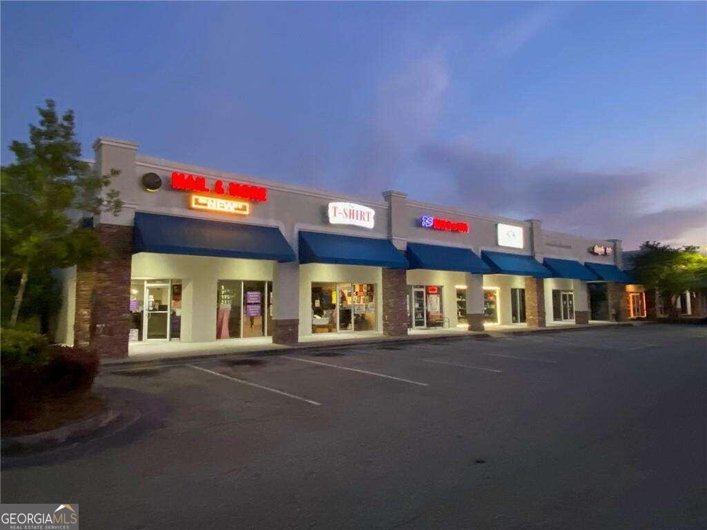 a view of a building with a street