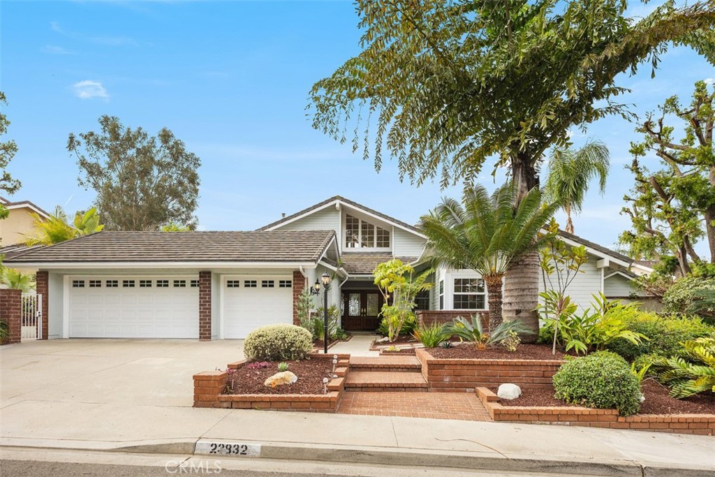 front view of a house with a small yard