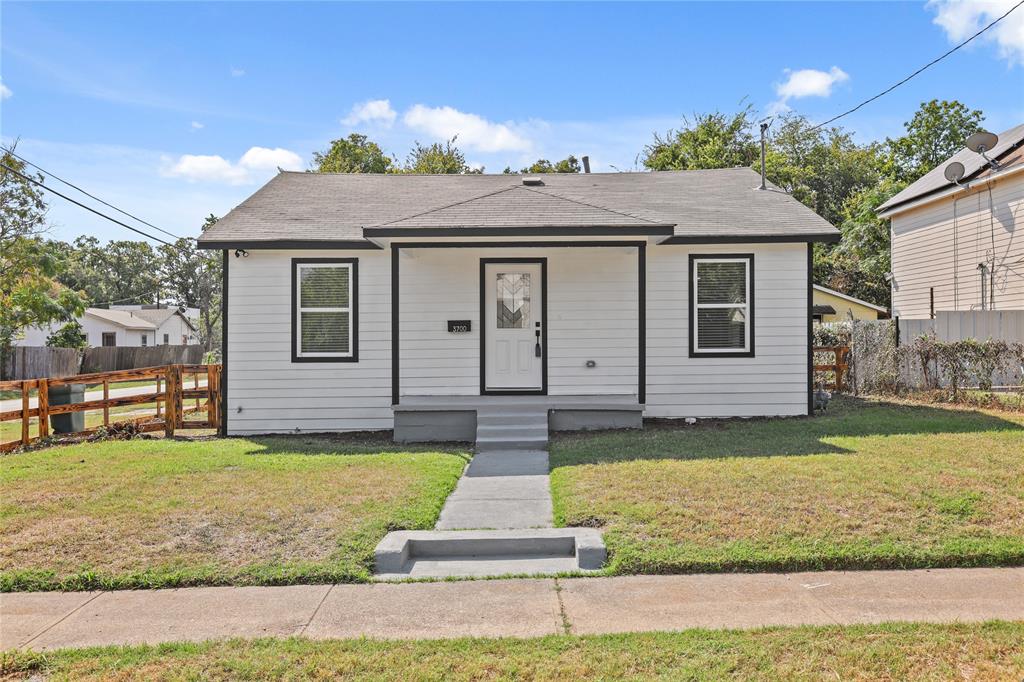 Bungalow-style home featuring a front yard