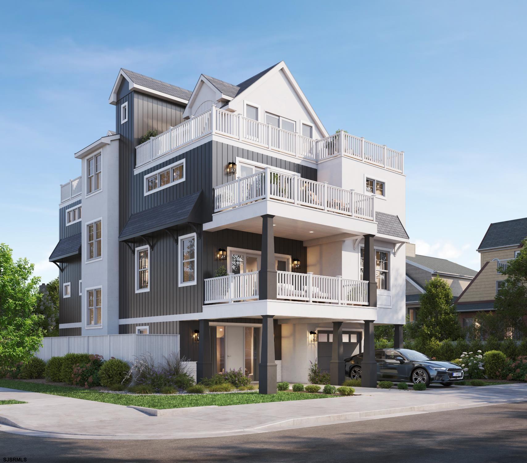 a front view of a residential apartment building with a street