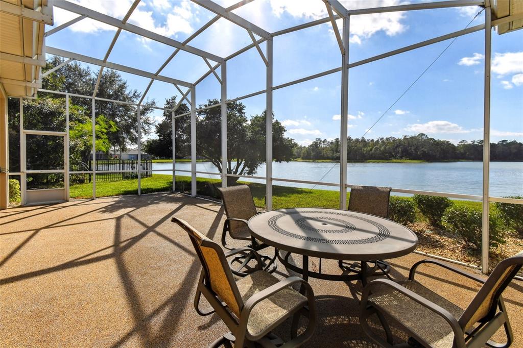 a view of sitting area with furniture and a yard