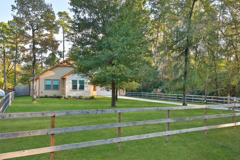 Built in 2017 and on a .73 acre lot, this 3 bedroom, 2.5 bath home is surrounded by a classic, three-board wood fence, complemented by a privacy gate.