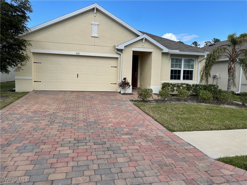 a front view of house with yard