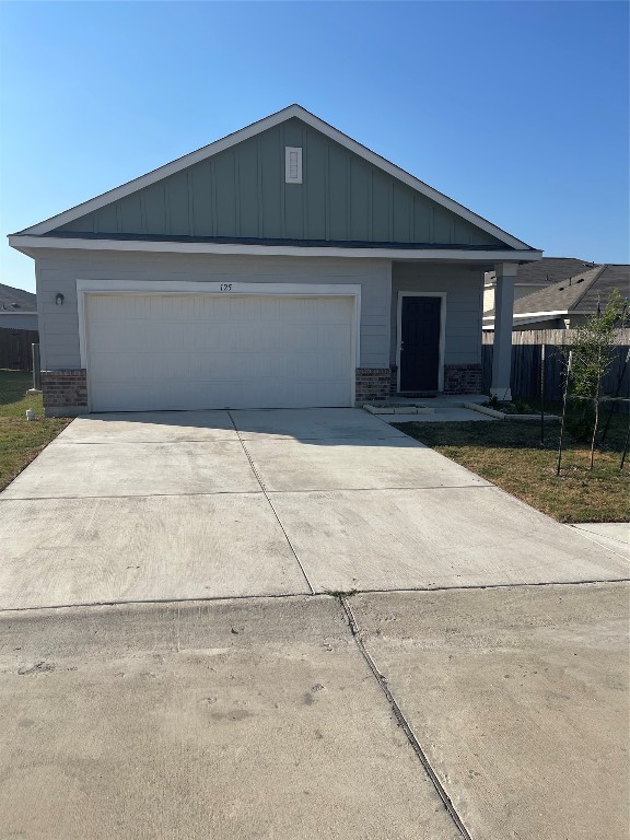 a front view of house with yard