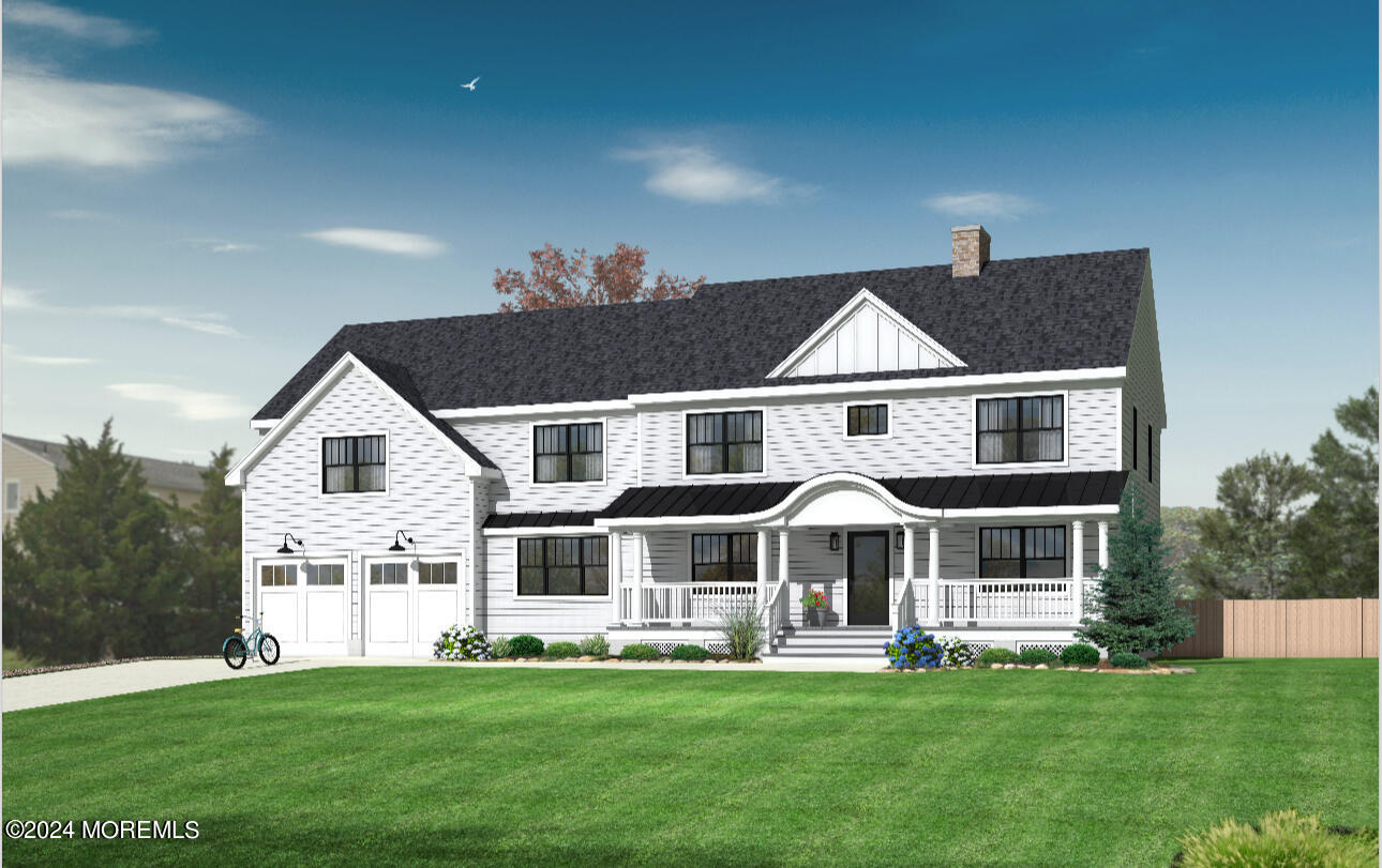 a front view of a house with a garden and porch