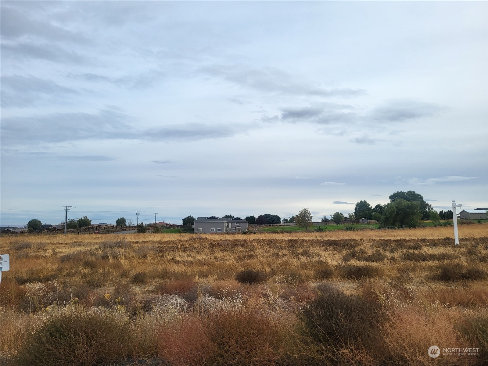 a view of a lake and building in the back