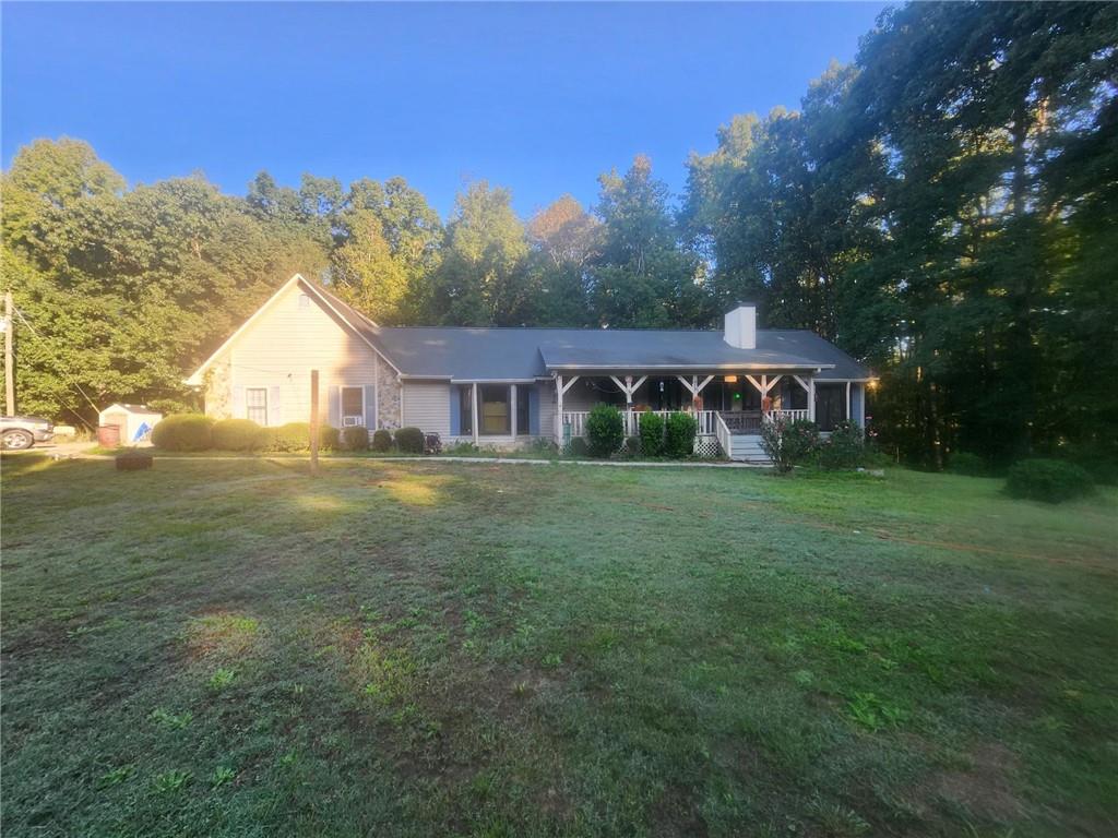 a view of house with outdoor space