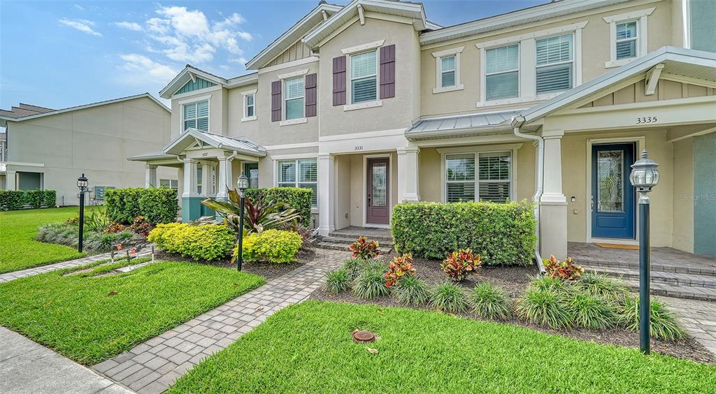 front view of a house with a yard