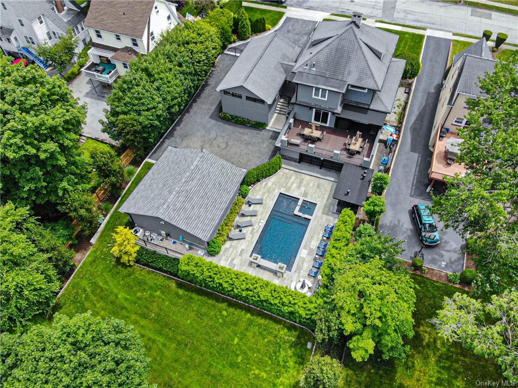 an aerial view of a house with a garden