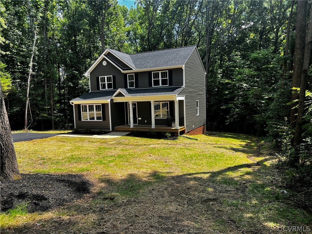 a front view of a house with swimming pool