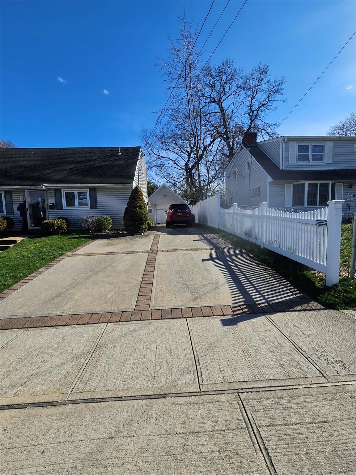 a view of a house with a street