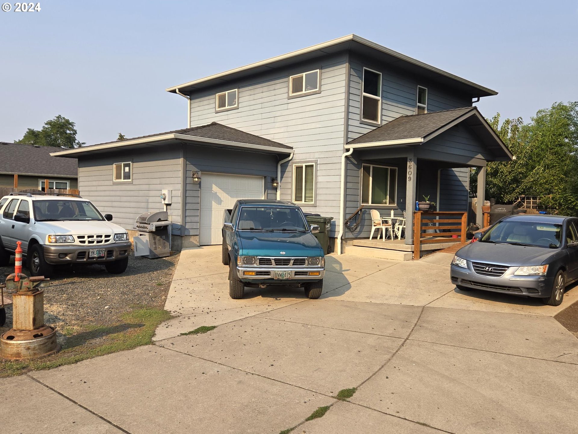 a car parked in front of a house