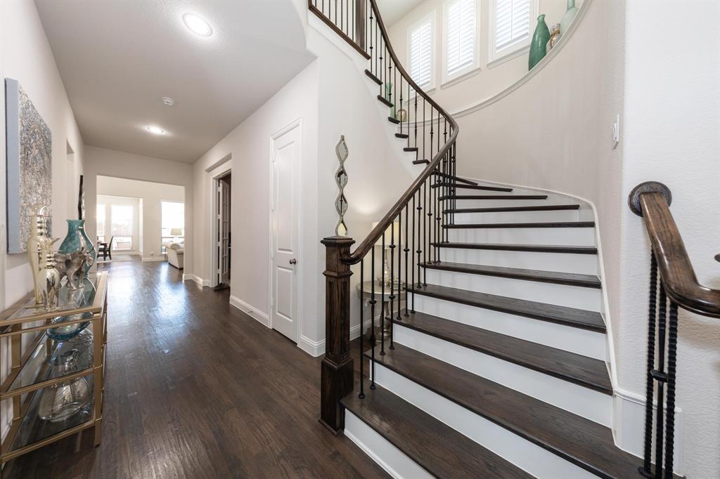 a view of entryway with wooden floor