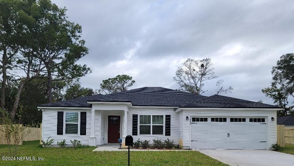 front view of a house with a yard