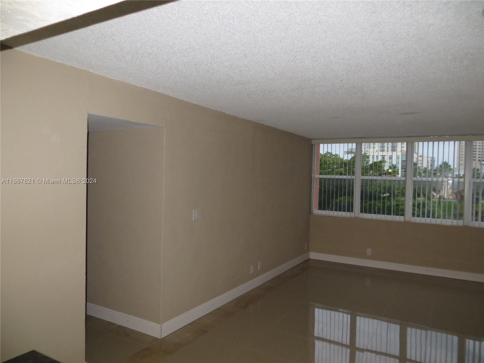 a view of empty room with window