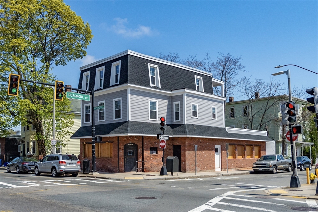 a view of a building with a street