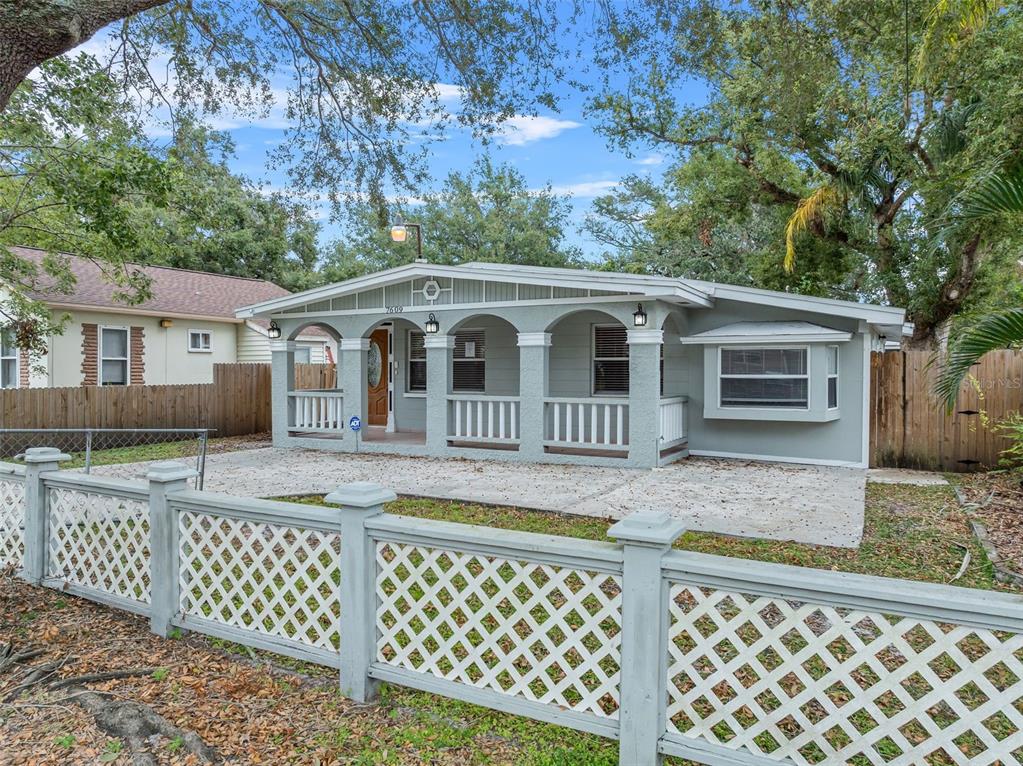 front view of a house with a yard