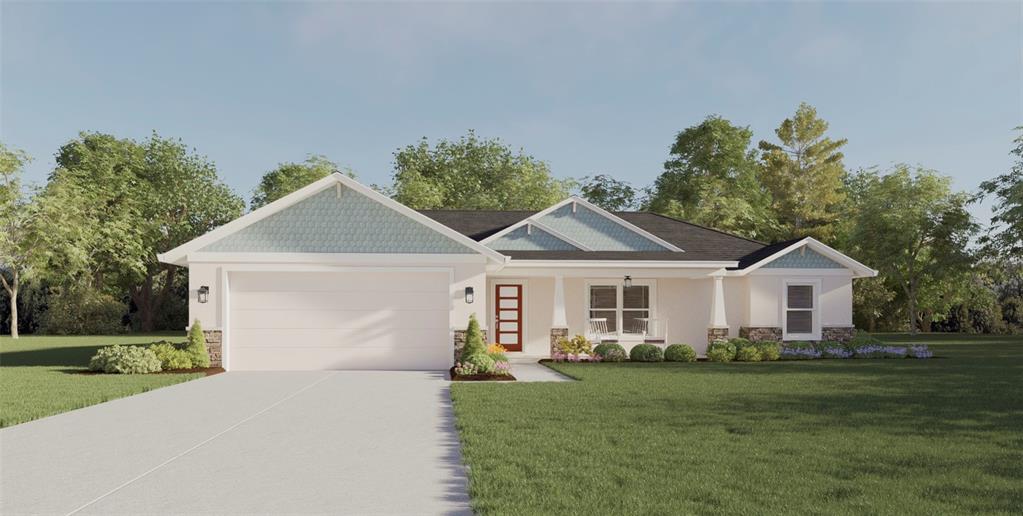 a front view of a house with a garden and trees