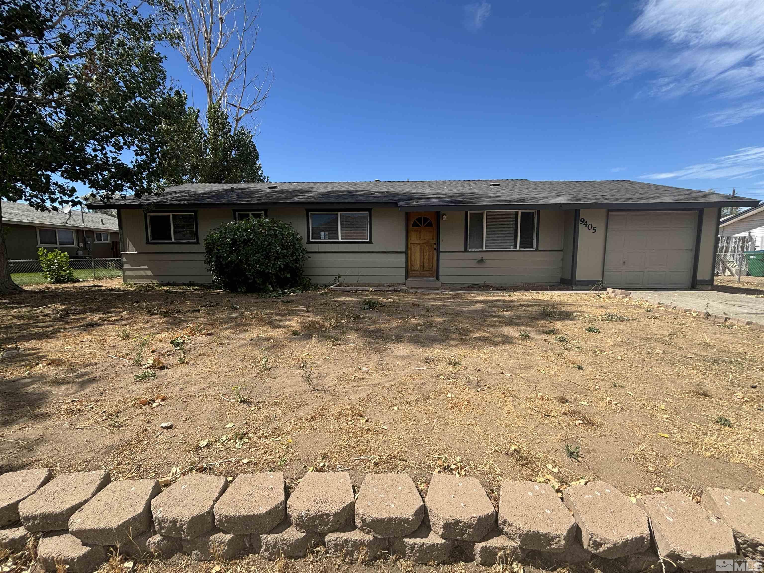 a front view of a house with yard