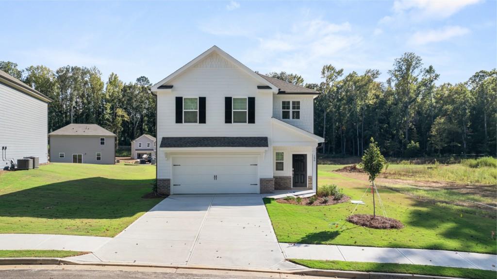 a front view of house with a yard