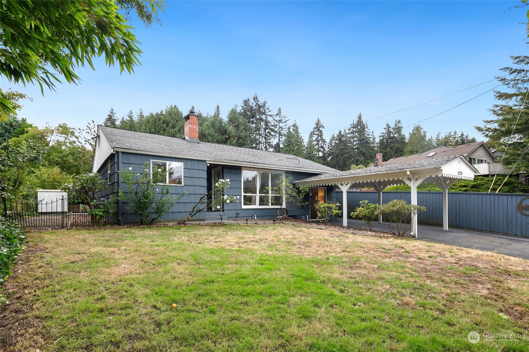 front view of a house with a yard