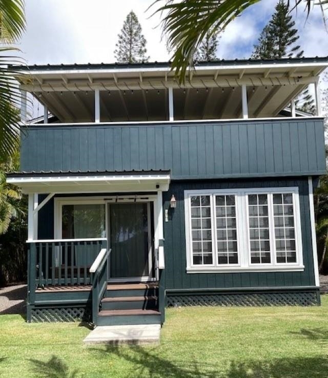 a front view of a house with a balcony