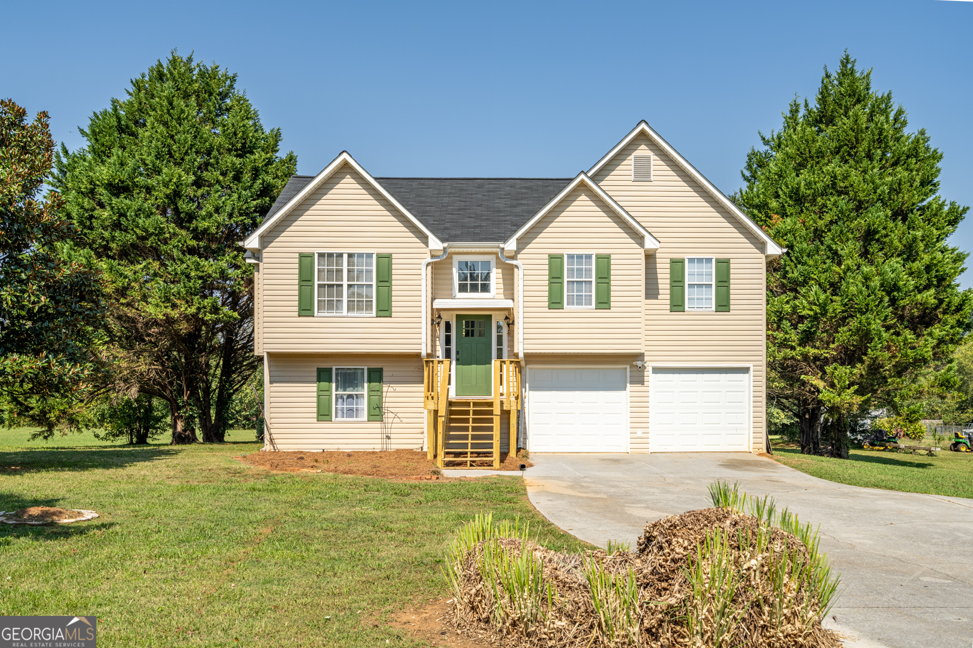 front view of a house with a yard