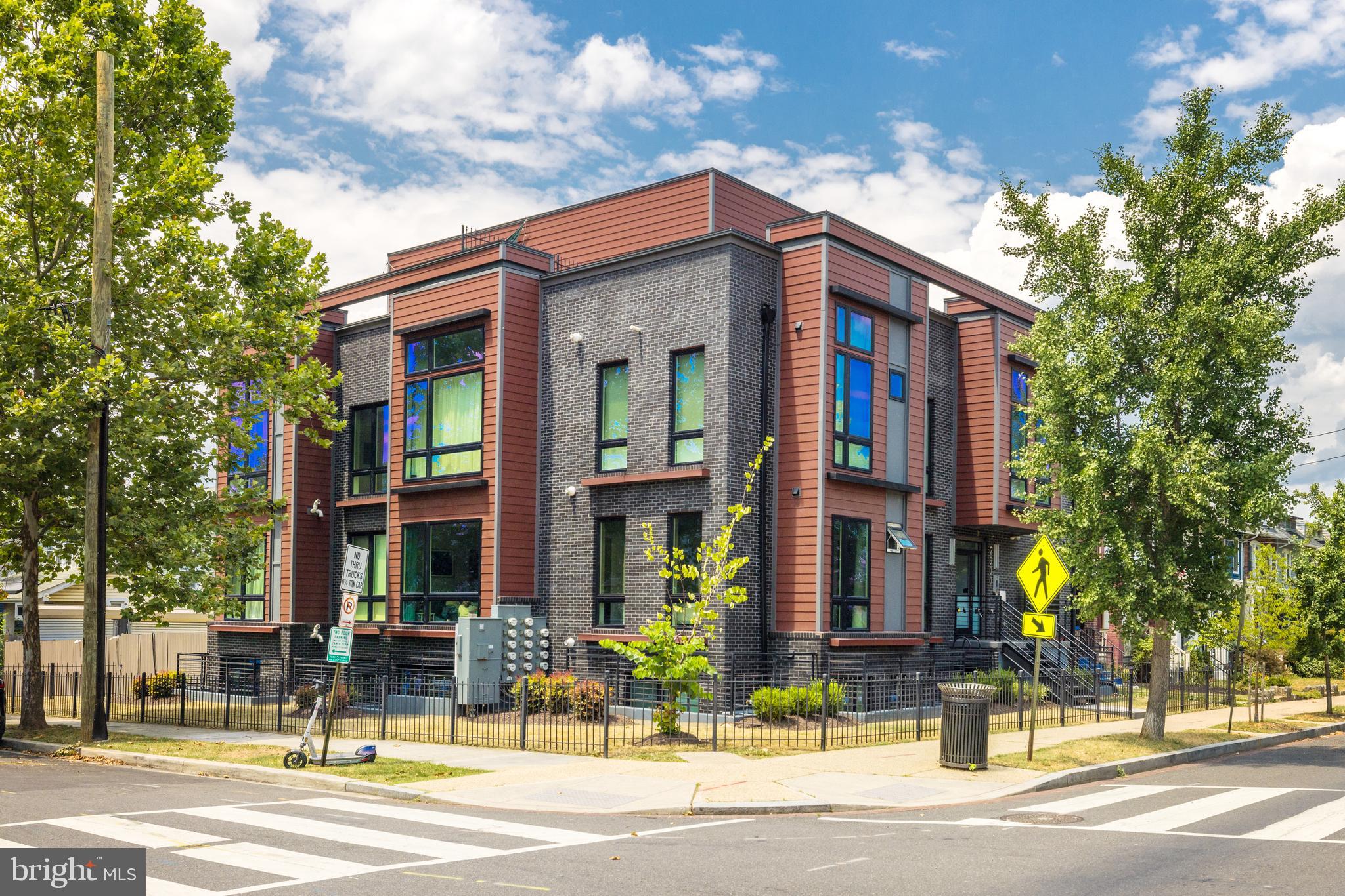 a view of a building with a street