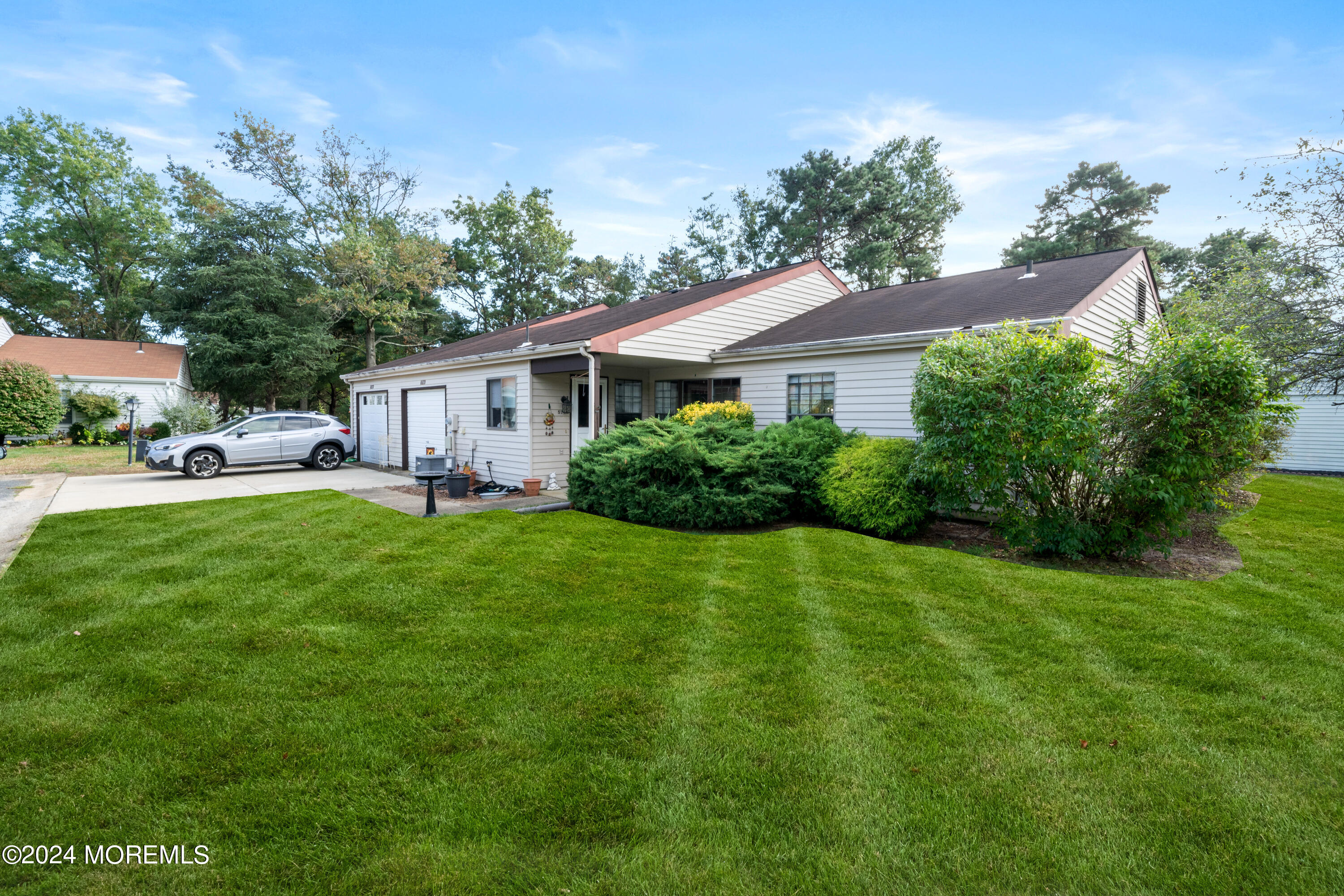 a house view with a garden space