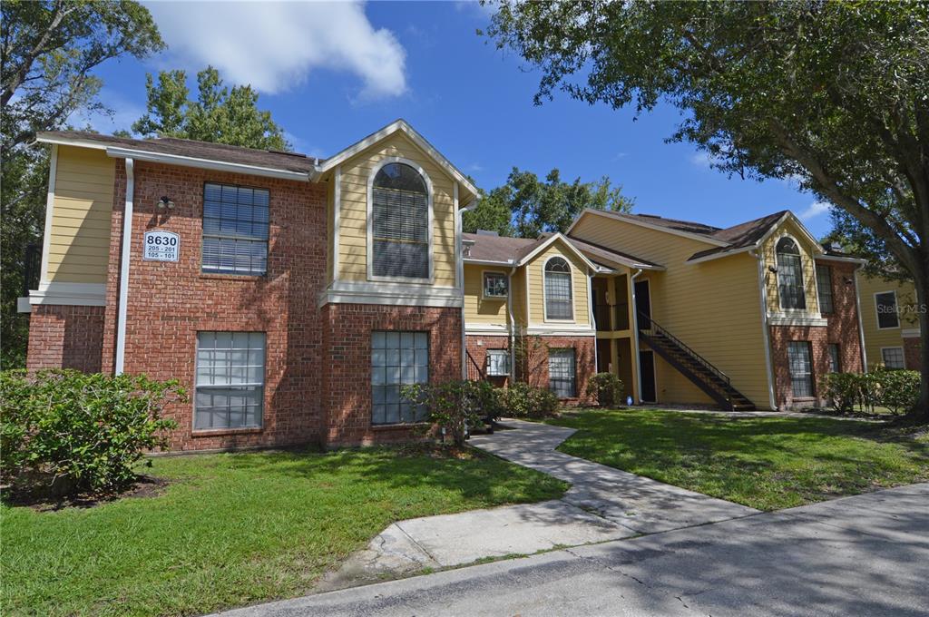 front view of a house with a yard