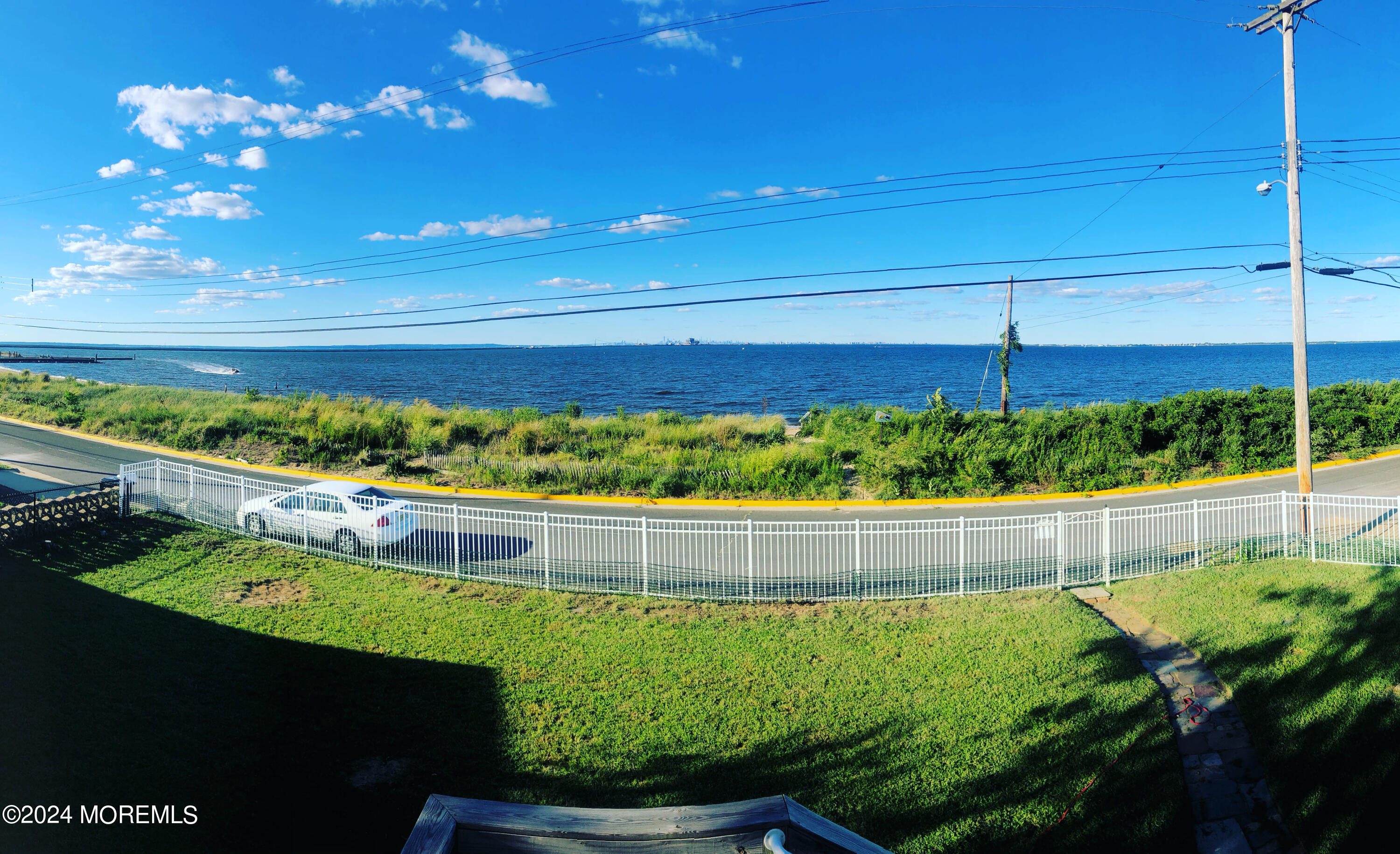 a view of a lake with a big yard