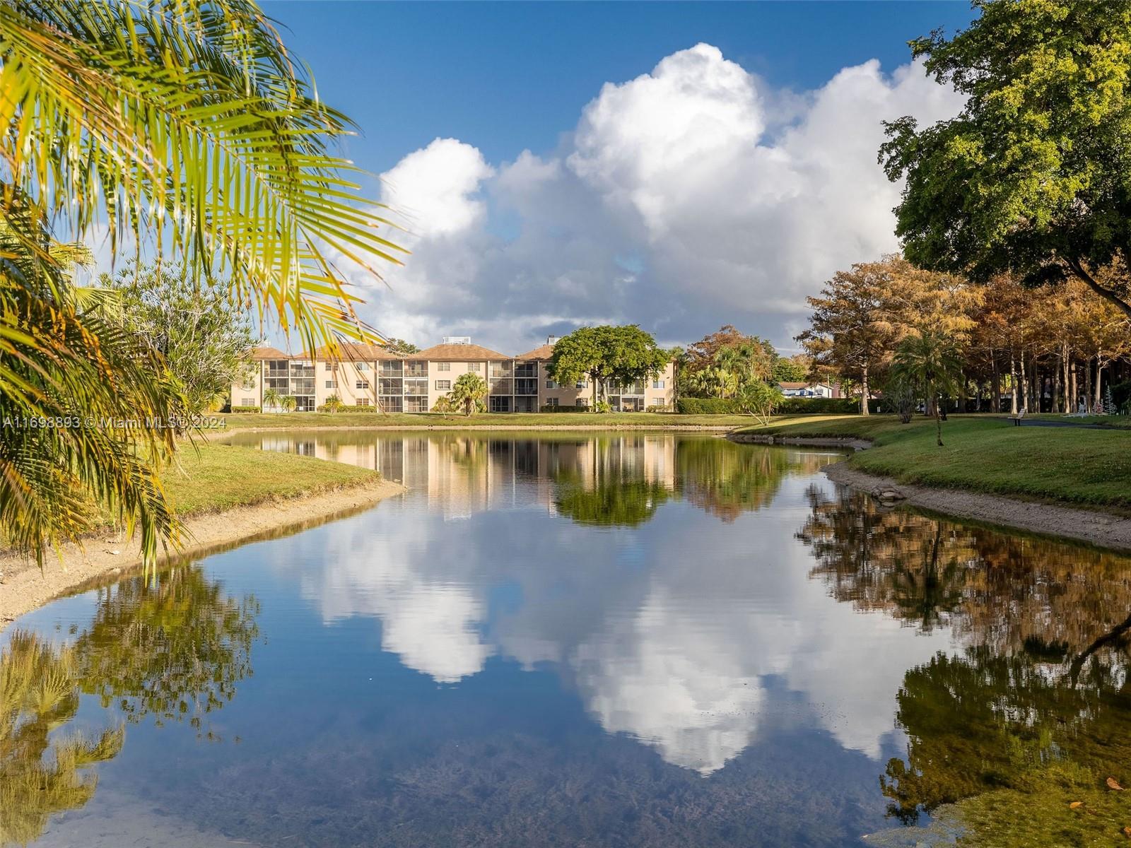 a view of a lake with a houses