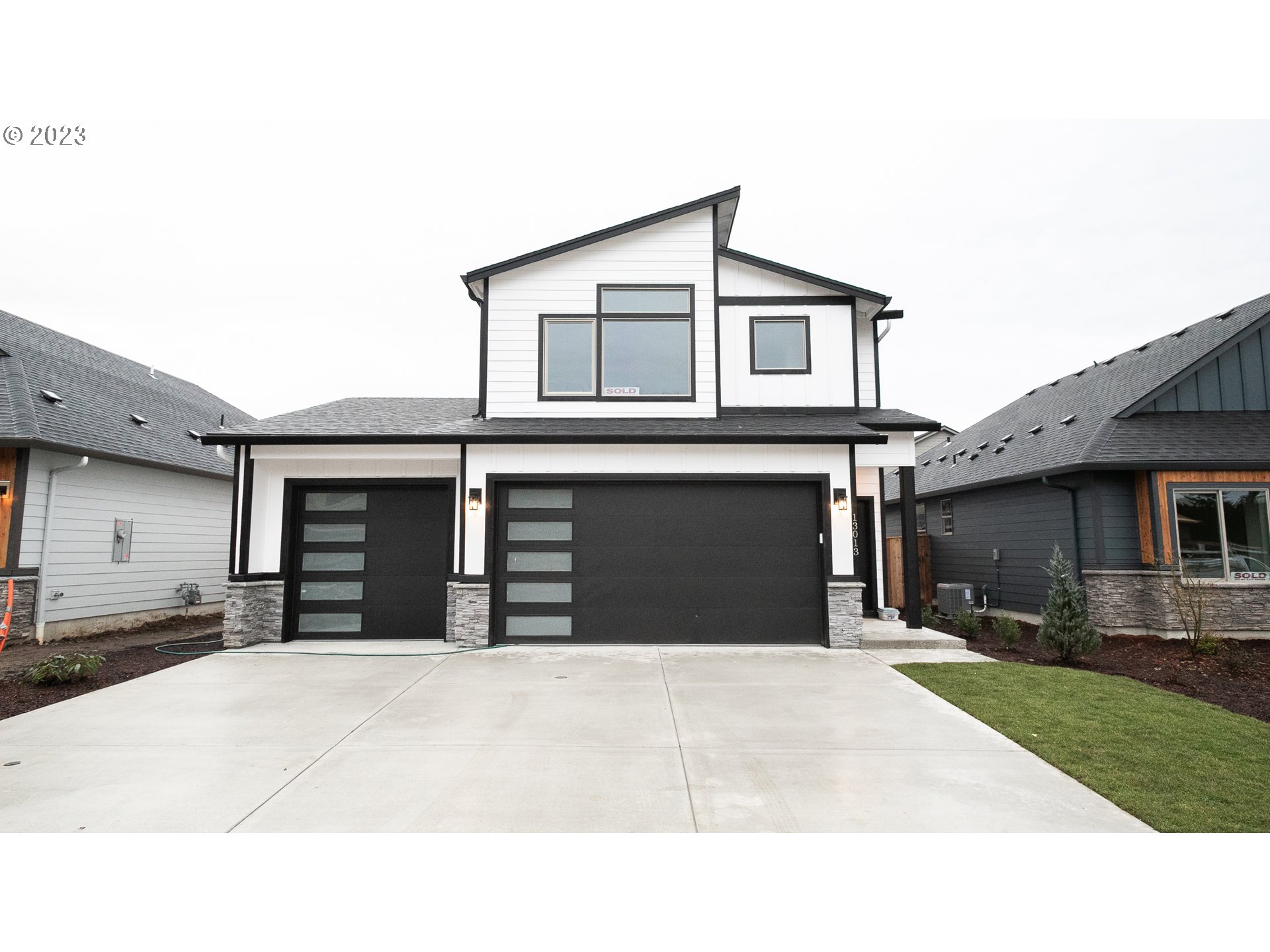 a black and white photo of a house