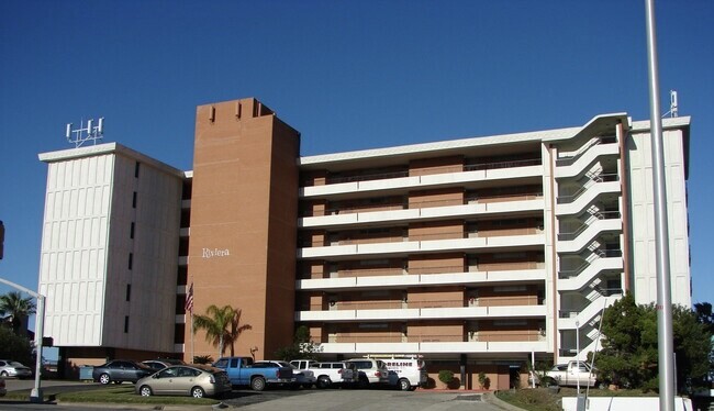 a front view of a building with a street