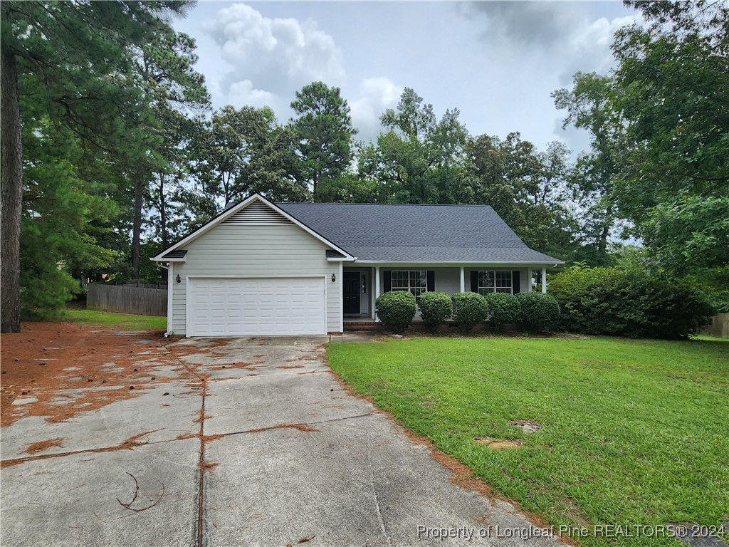 a front view of a house with yard