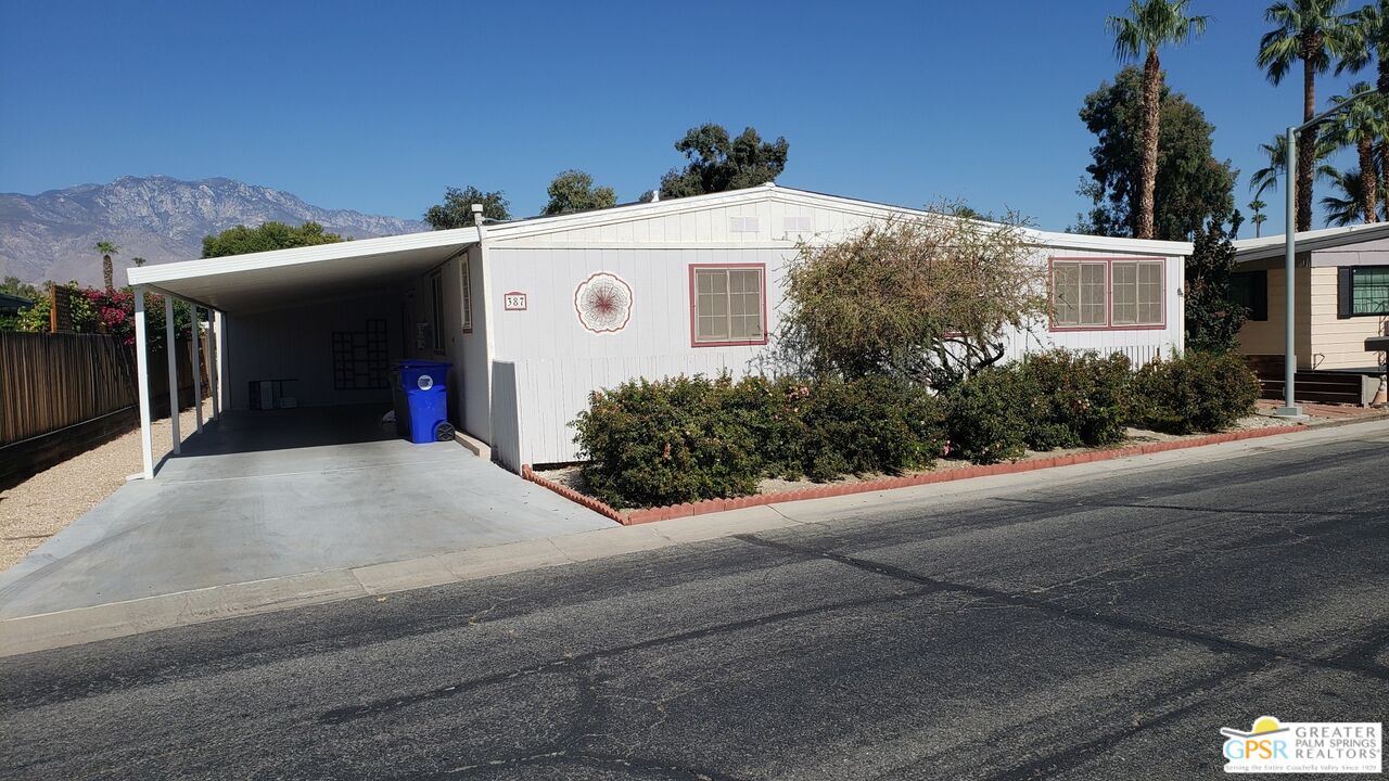 a view of a house with a garage