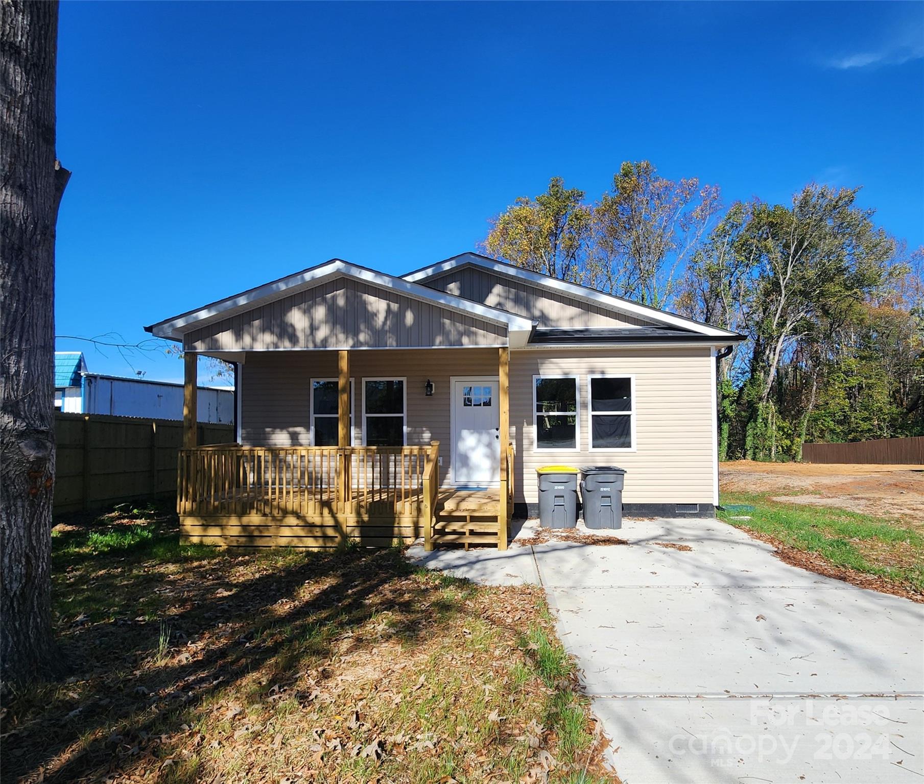 a front view of a house with yard