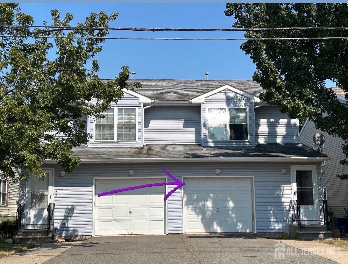 a front view of a house with yard