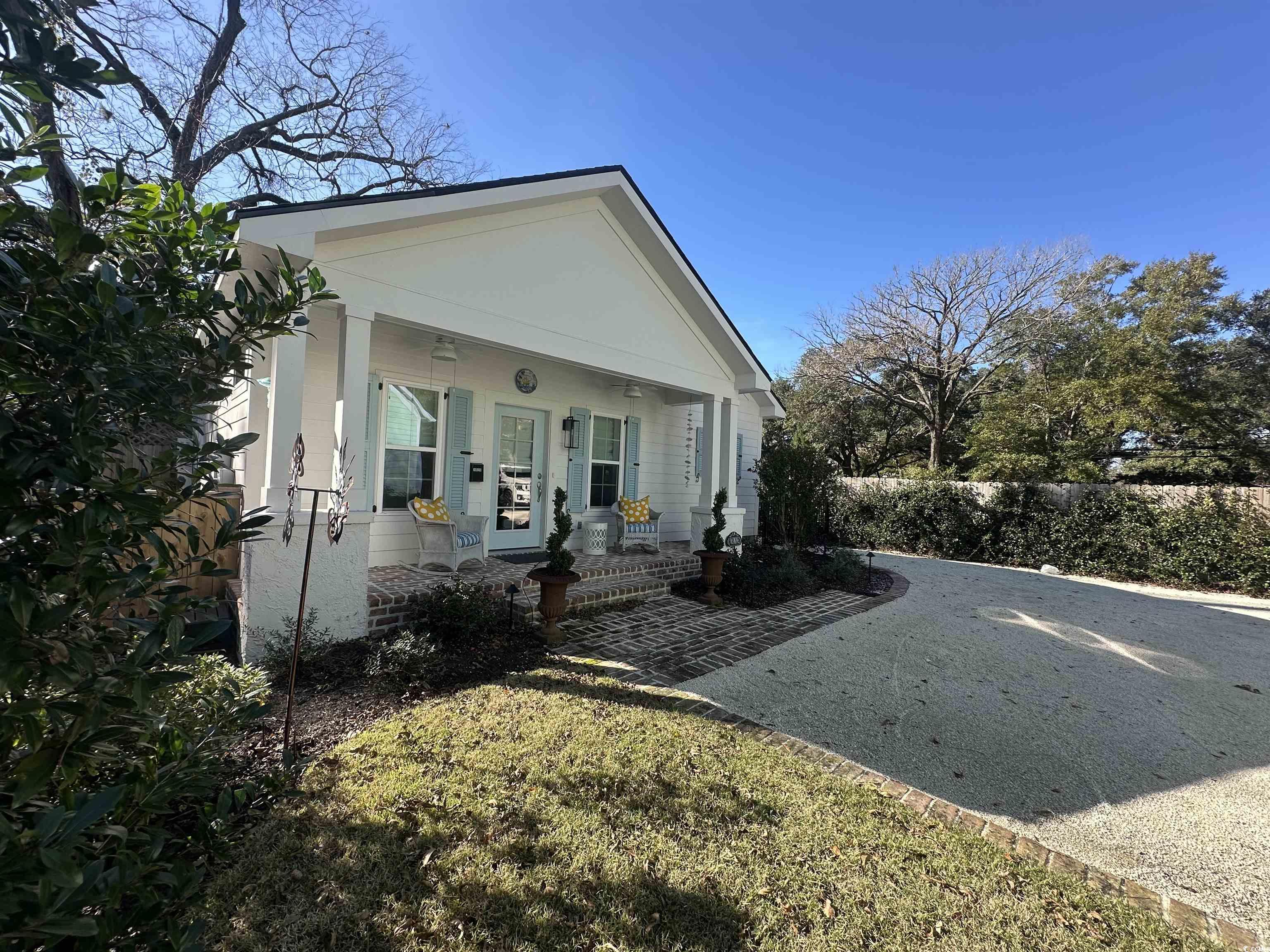 View of front of home featuring covered porch