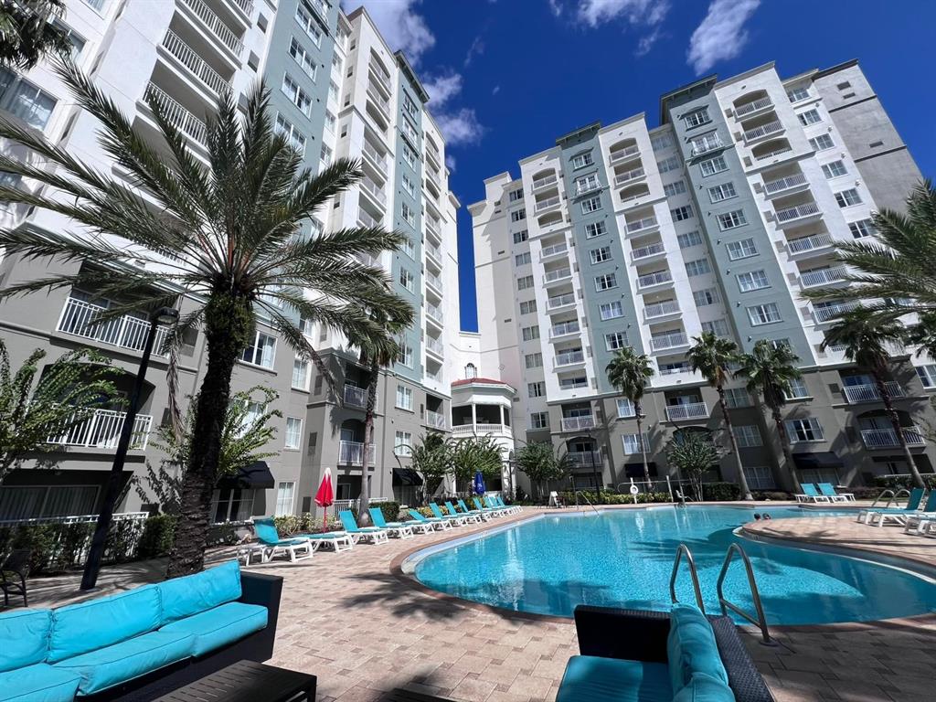 a view of a building with a swimming pool