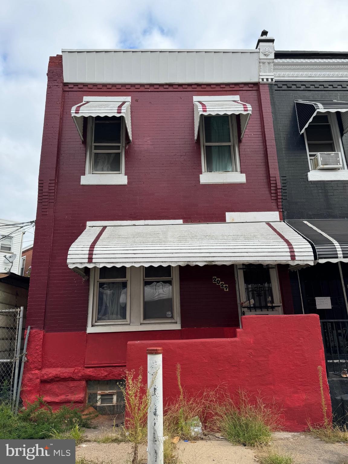 a front view of a house with yard