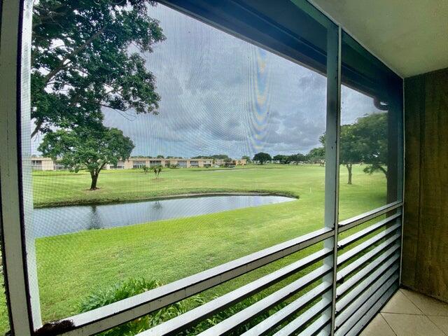 a view of a back yard from a balcony