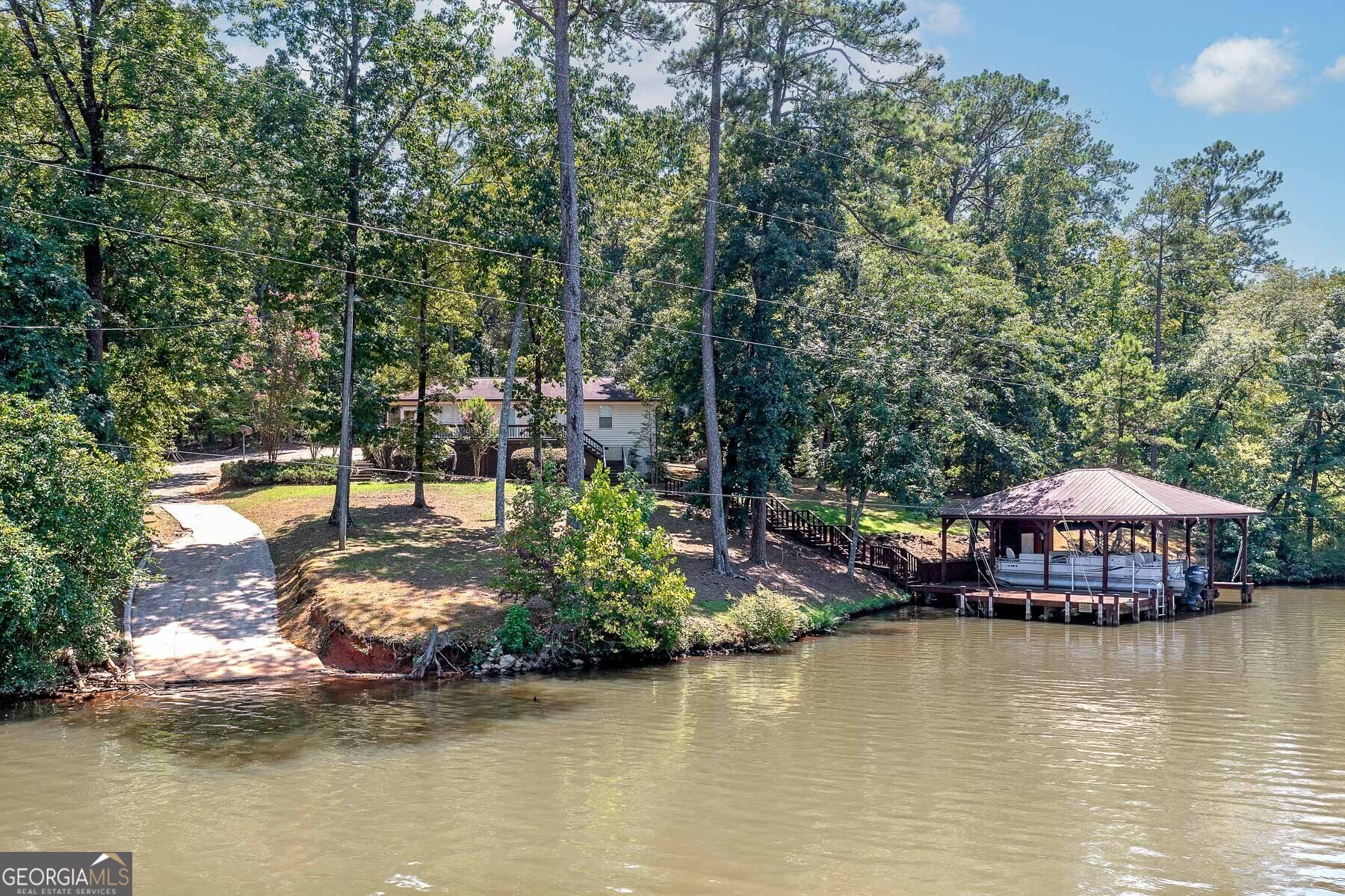 a view of a lake with a house