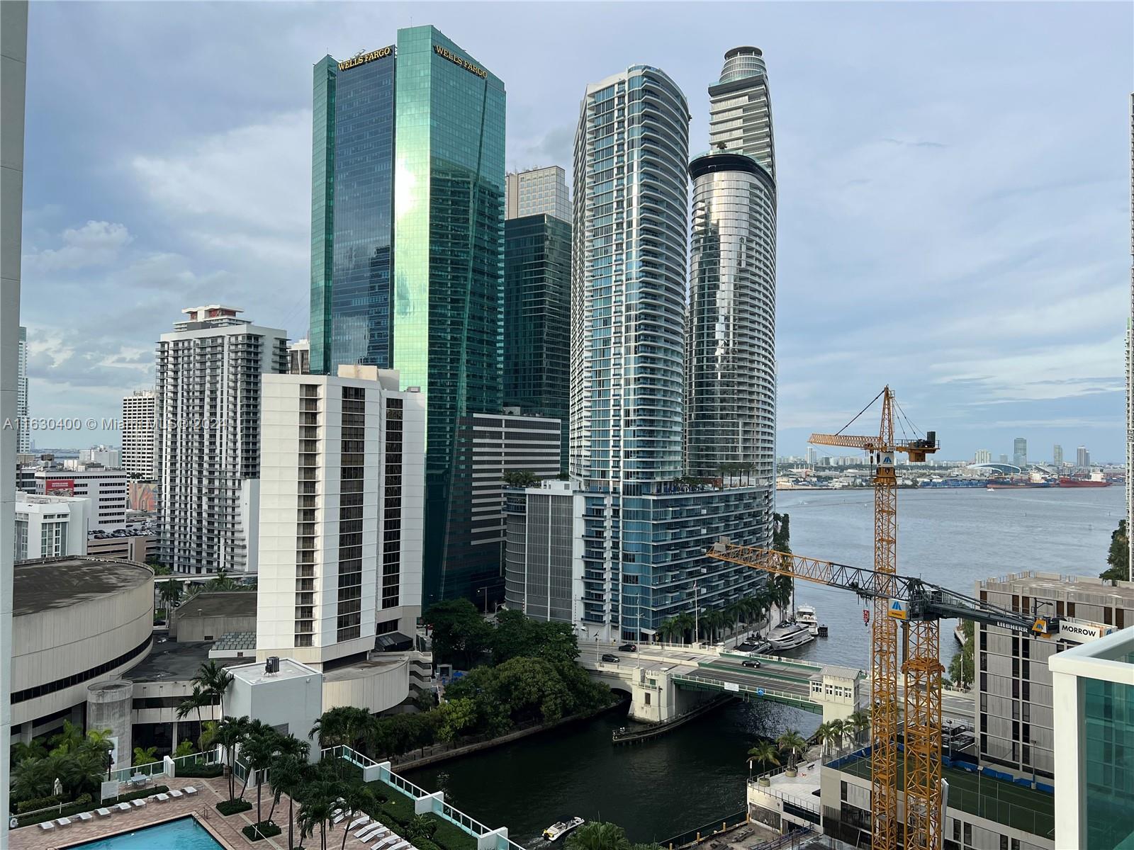 a view of a city with tall buildings