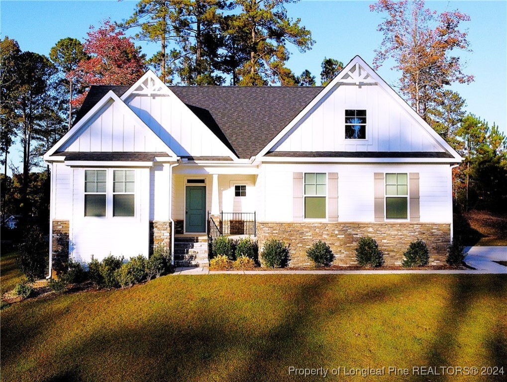 a front view of a house with swimming pool