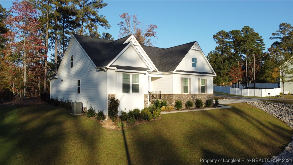 a very nice looking house with a large window