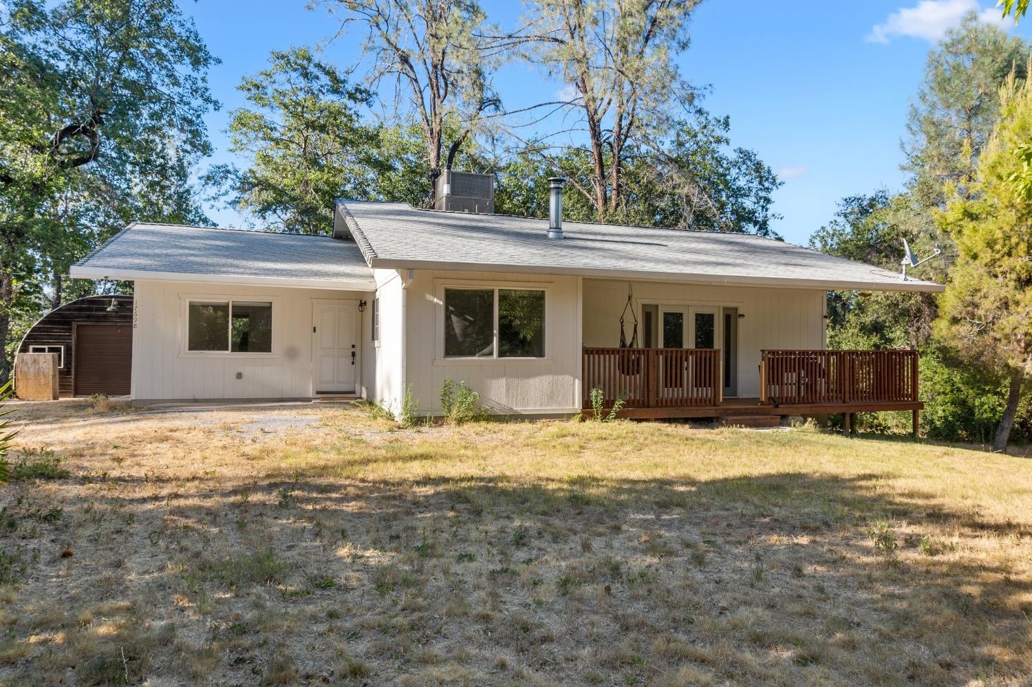 a house with yard in front of it