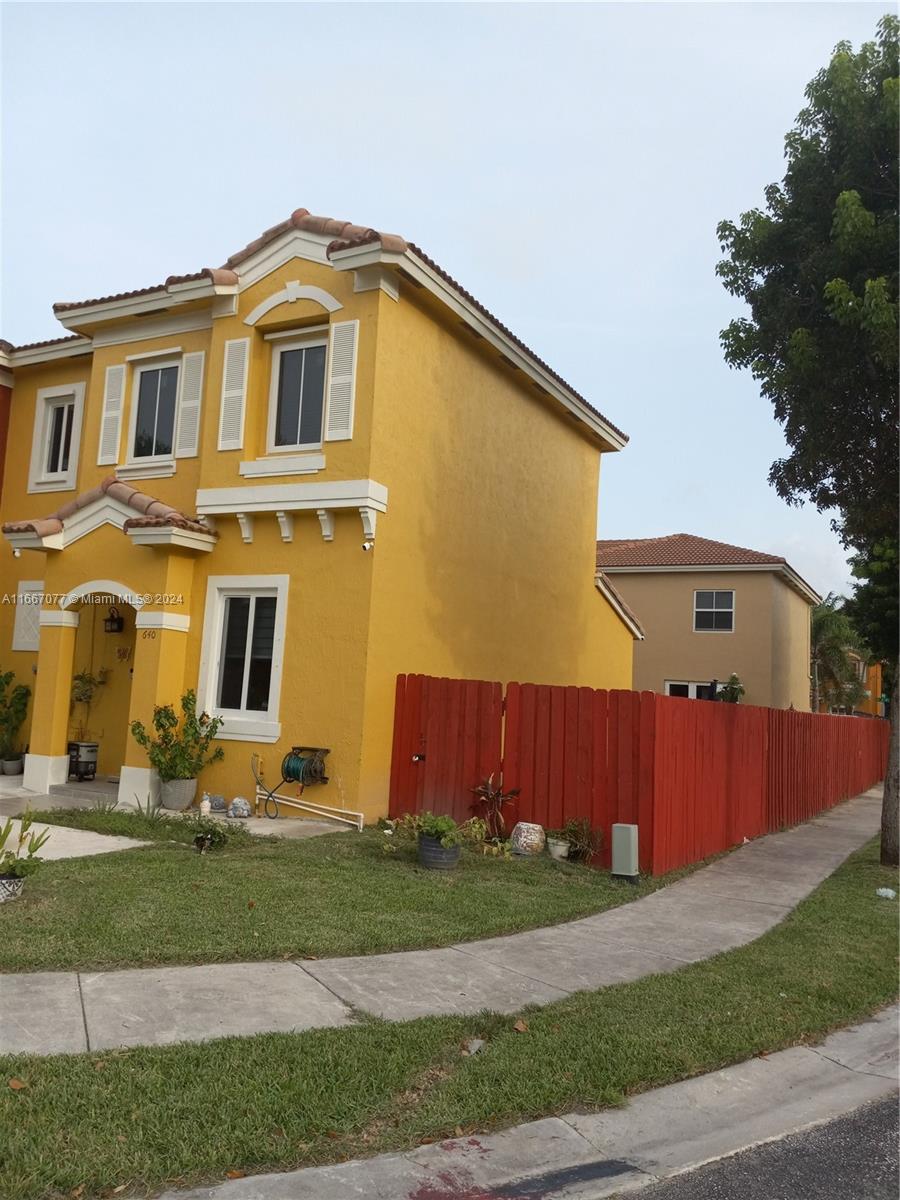 a front view of house with yard