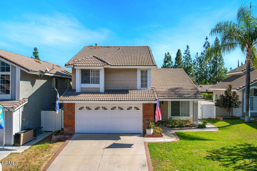 front view of house with a yard