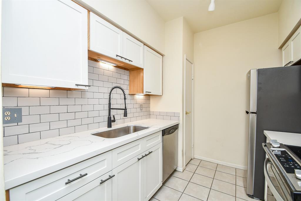 Updated kitchen! Undermount sink, lots of prep space plus pantry